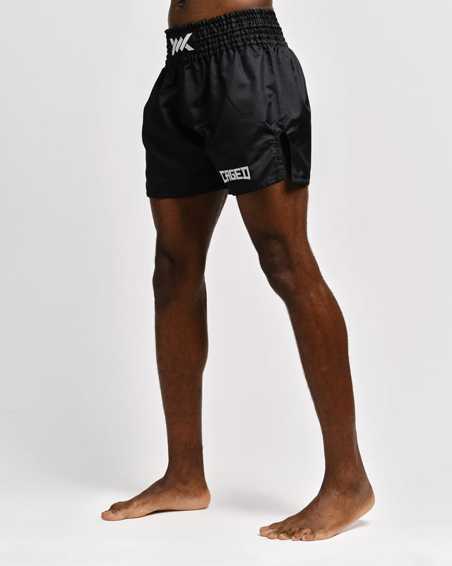 Pantaloncini Muay Thai Caged Classic – Nero/Bianco