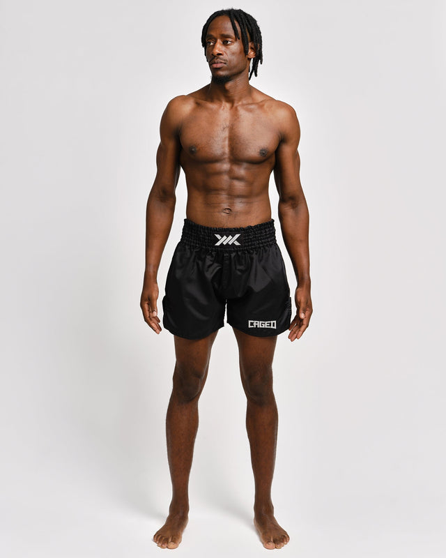 Pantaloncini Muay Thai Caged Classic – Nero/Bianco