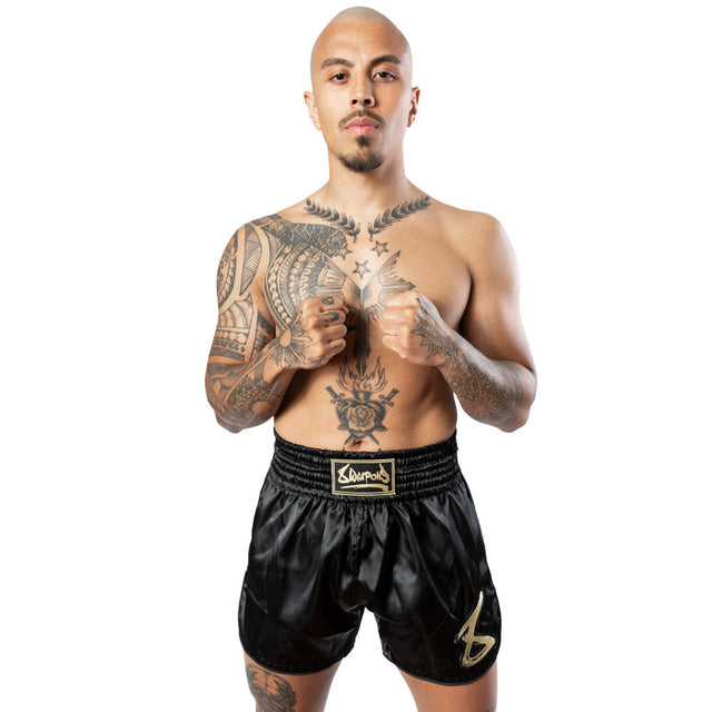 8 WEAPONS Muay Thai Shorts Strike – Black/Gold