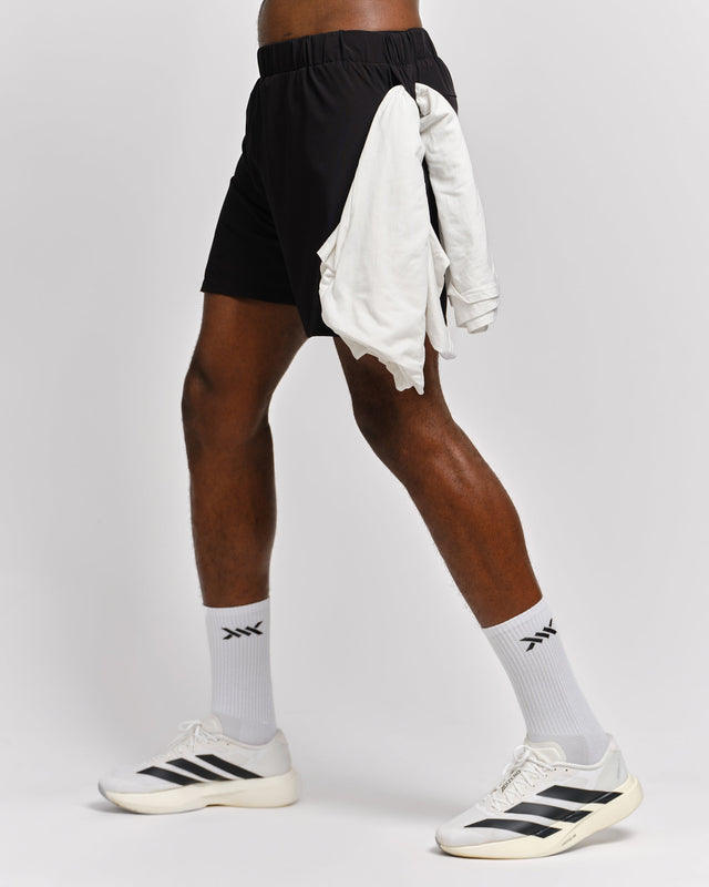 Pantaloncini da allenamento Caged 2-in-1 Stride – Nero