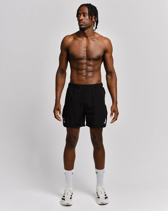 Pantaloncini da allenamento Caged 2-in-1 Stride – Nero