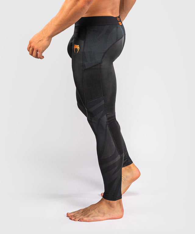 Venum G-Fit Revolution Compression shorts – Black/Bronze