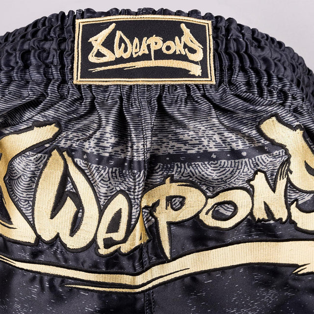 Pantaloncini Muay Thai 8 WEAPONS Hanuman – Nero/Oro