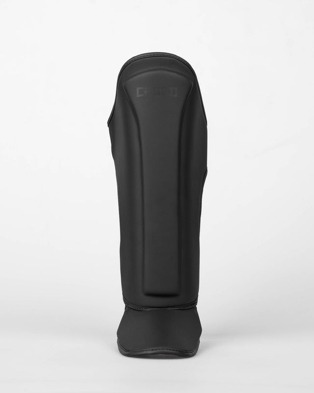 Caneleiras Caged Spark Criança – Preto Mate