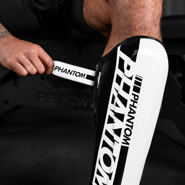 Espinilleras Phantom Athletics APEX Striking – Blanco