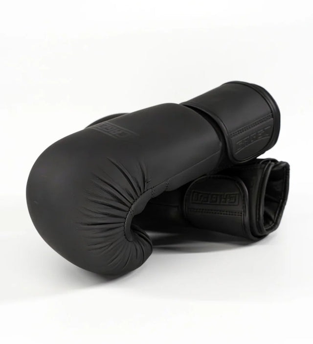 Caged Shadow Bundel Deal – Boxhandschuhe + Schienbeinschoner