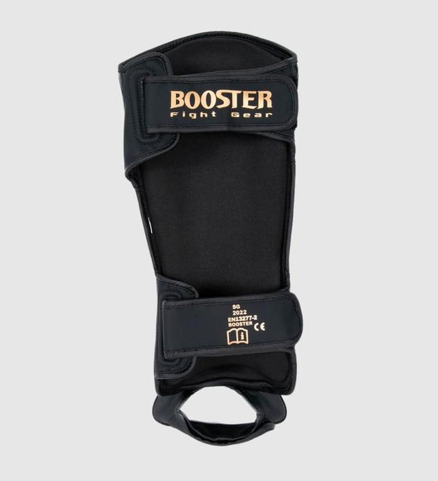 Caneleiras de kickboxing Booster Bangkok – Preto/Ouro – Caneleiras