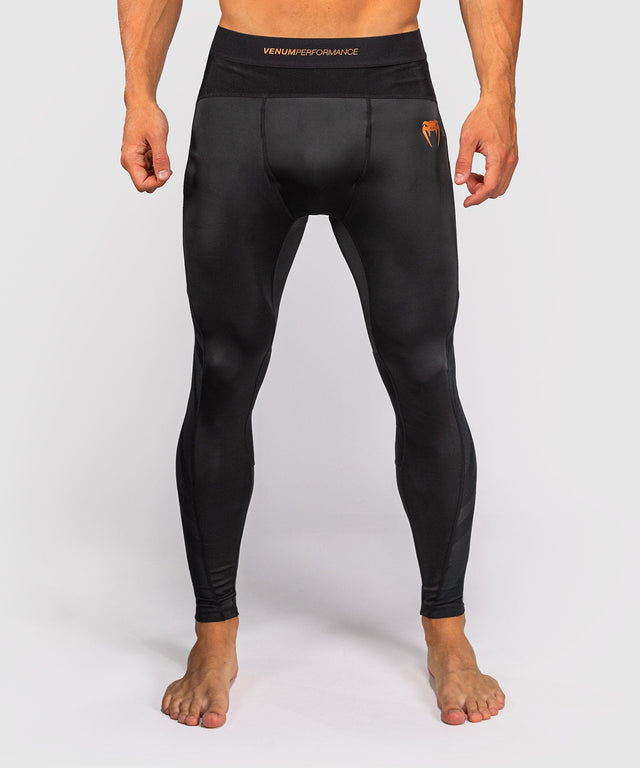 Venum G-Fit Revolution Compression shorts – Black/Bronze