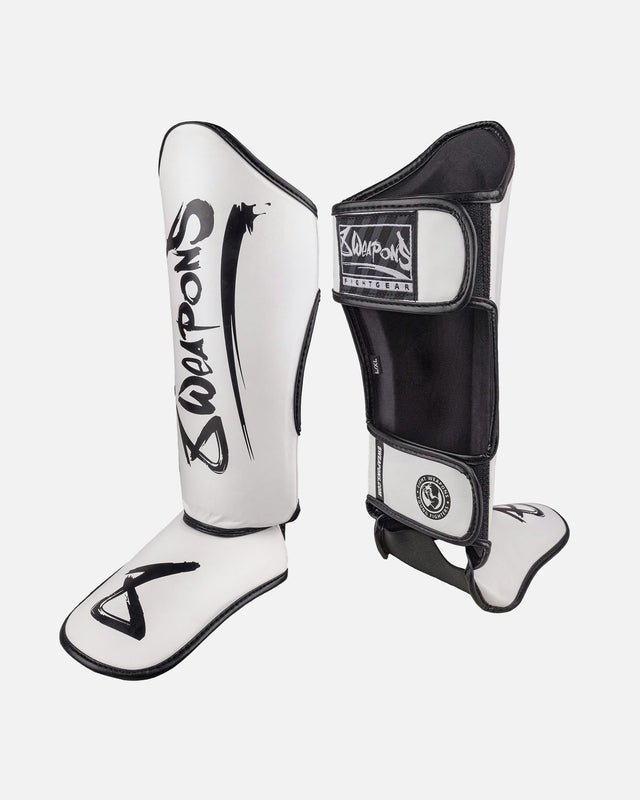 Espinilleras 8 WEAPONS Unlimited 2.0 – Blanco/Negro