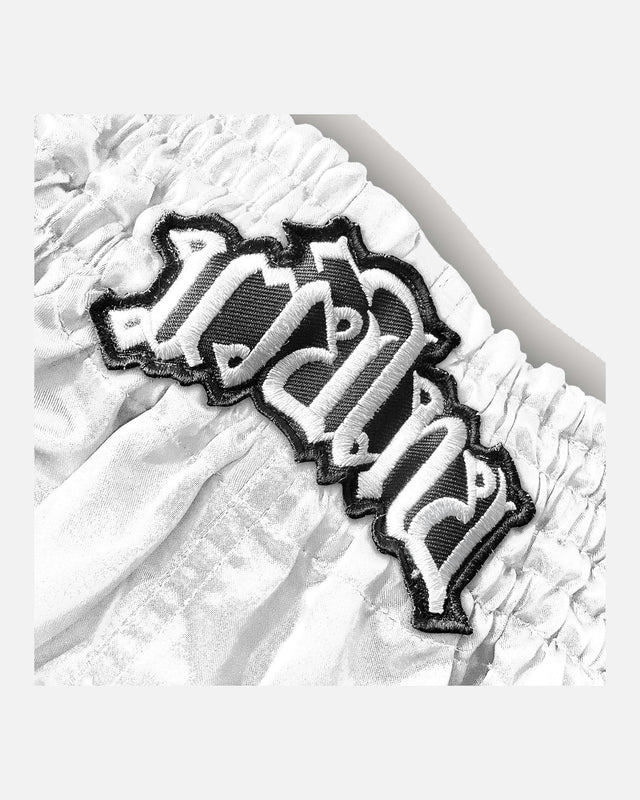 Muay Thai trenky 8 WEAPONS Mongkol – Bílé/Černé