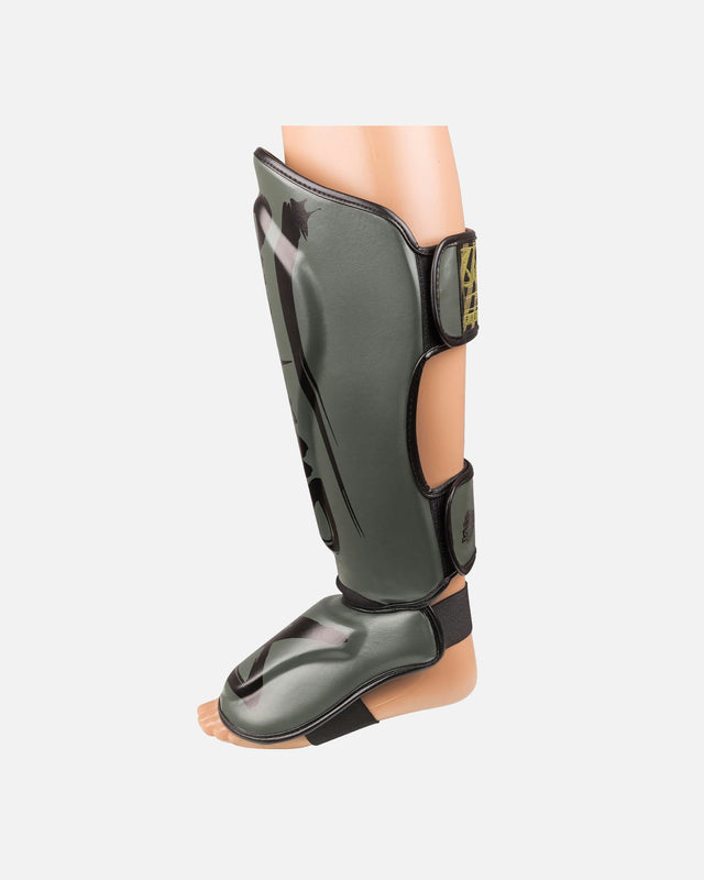 8 WEAPONS Schienbeinschoner Unlimited 2.0 – Olive/Schwarz