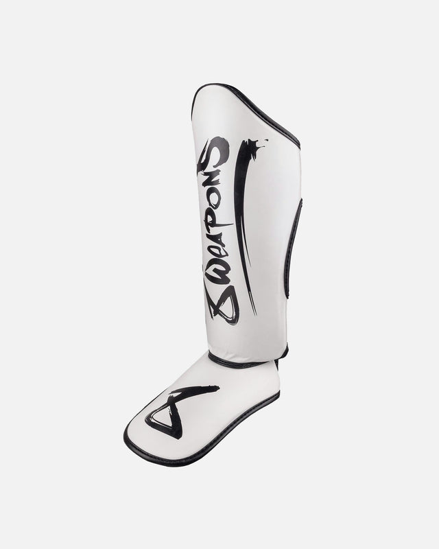 Espinilleras 8 WEAPONS Unlimited 2.0 – Blanco/Negro