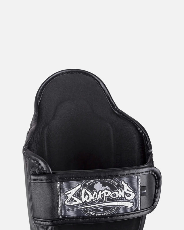 8 WEAPONS Skinnebensbeskyttere BIG 8 Premium - Sort