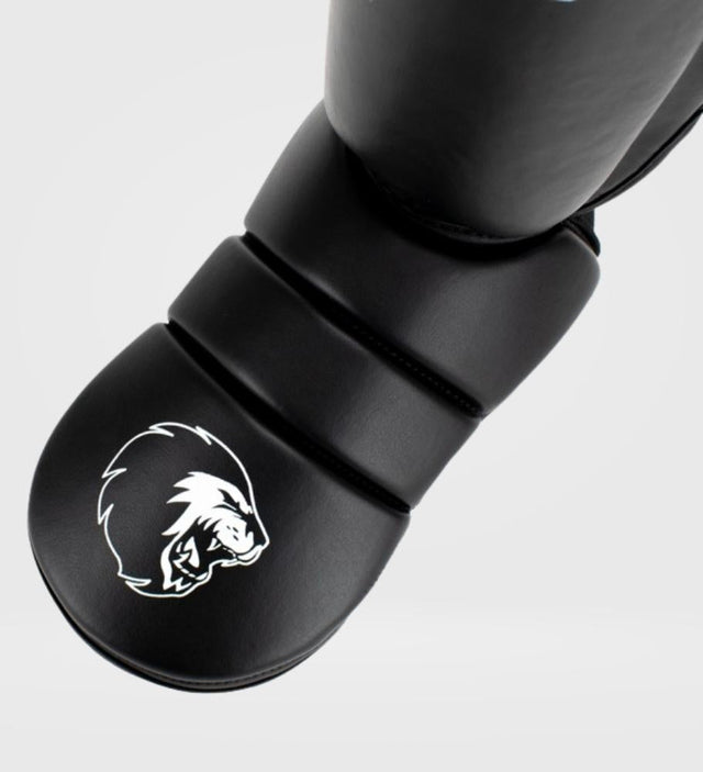 Tibiere Super Pro Kickboks Protector – Negru/Alb – Tibiere