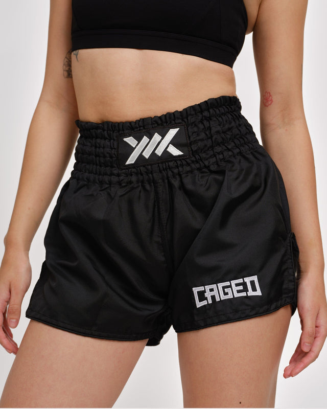 Pantaloncini Muay Thai Caged Classic – Nero/Bianco donna