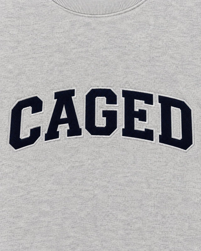 Mikina Caged Varsity – Šedá Melange