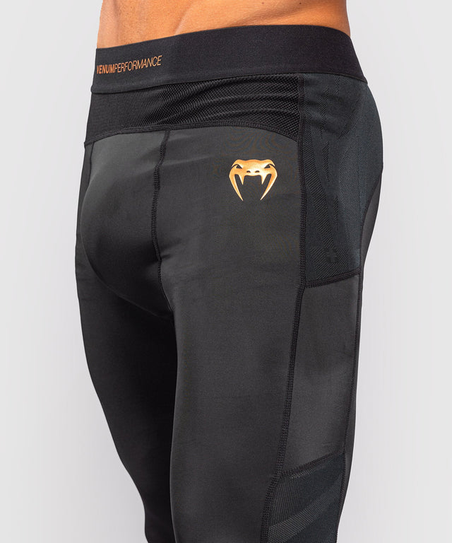Venum G-Fit Revolution Compression shorts – Black/Bronze