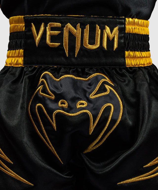 Pantaloncini Muay Thai Venum Bangkok Fury – Bambini Nero/Oro