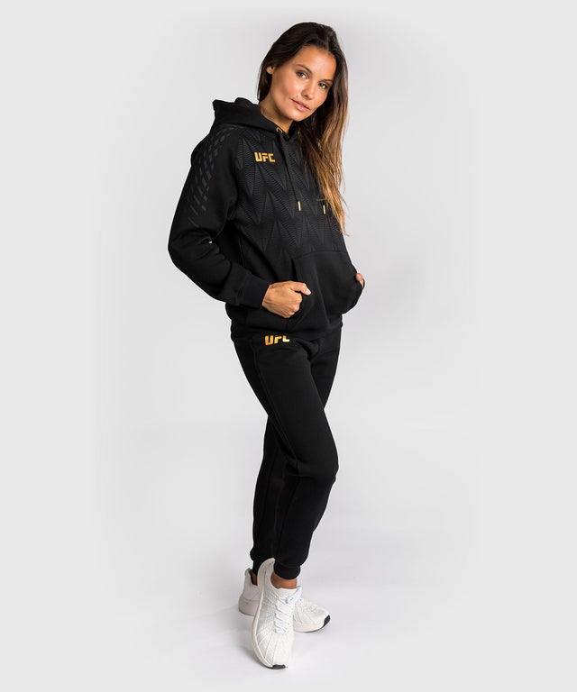 Sudadera con capucha UFC Venum Zenith para mujer – Negro/Oro