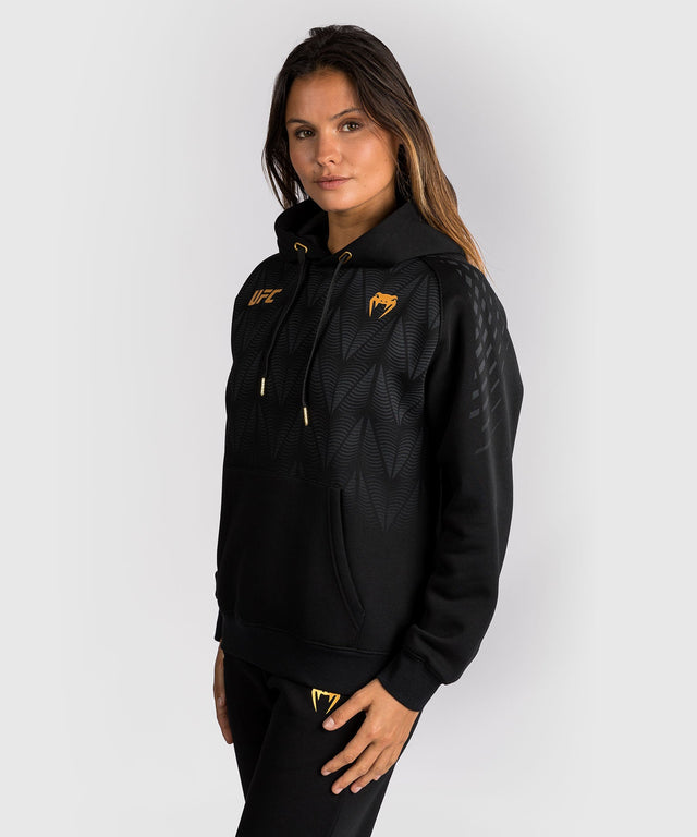 Sudadera con capucha UFC Venum Zenith para mujer – Negro/Oro