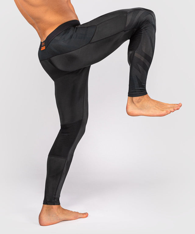 Venum G-Fit Revolution Compression shorts – Black/Bronze