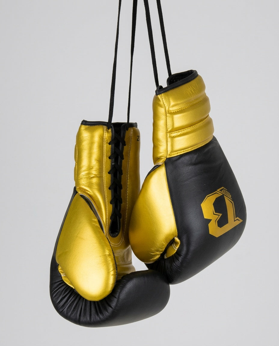 Guantoni da boxe Booster Rapid Strike con allacciatura – Nero/Oro