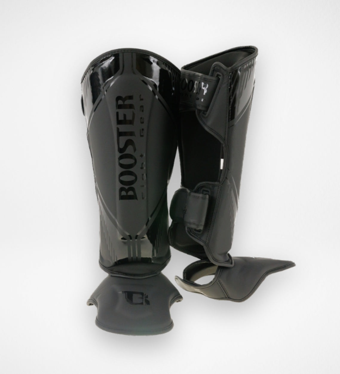 Espinilleras Booster Bangkok – Negro/Negro