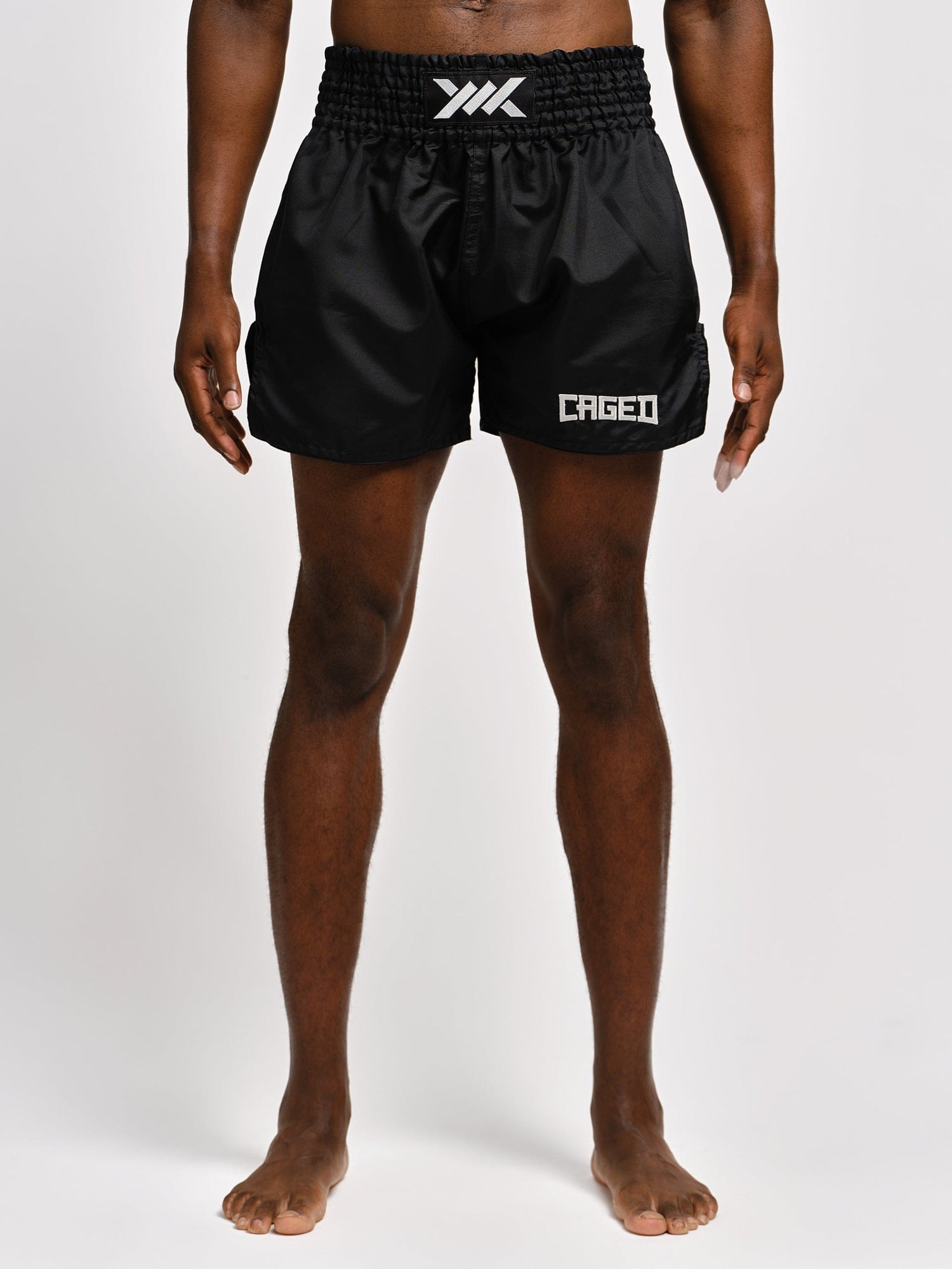Pantaloncini Muay Thai Caged Classic – Nero/Bianco