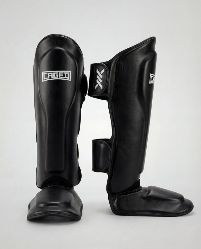 Caged Benskydd 'X' Series – Svart/Vit
