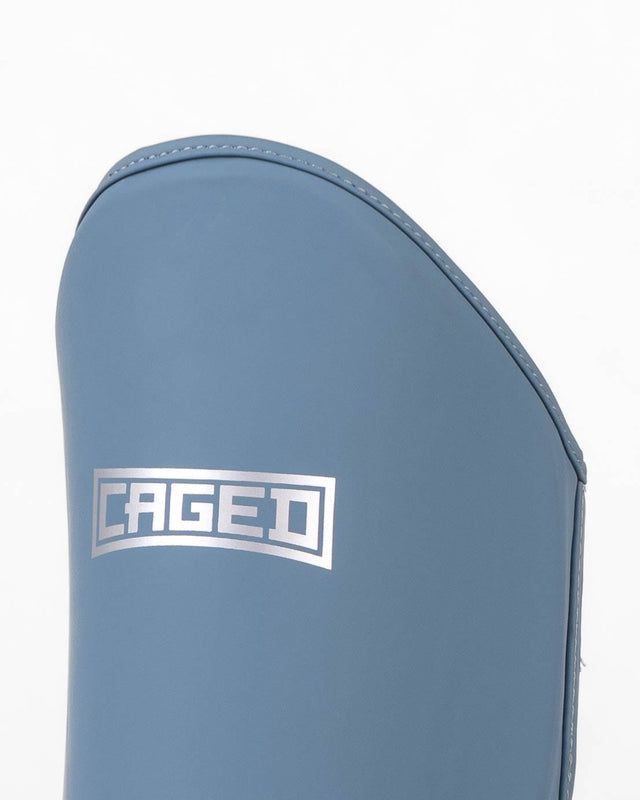 Ochraniacze na piszczele Caged Shadow – Midnight Blue