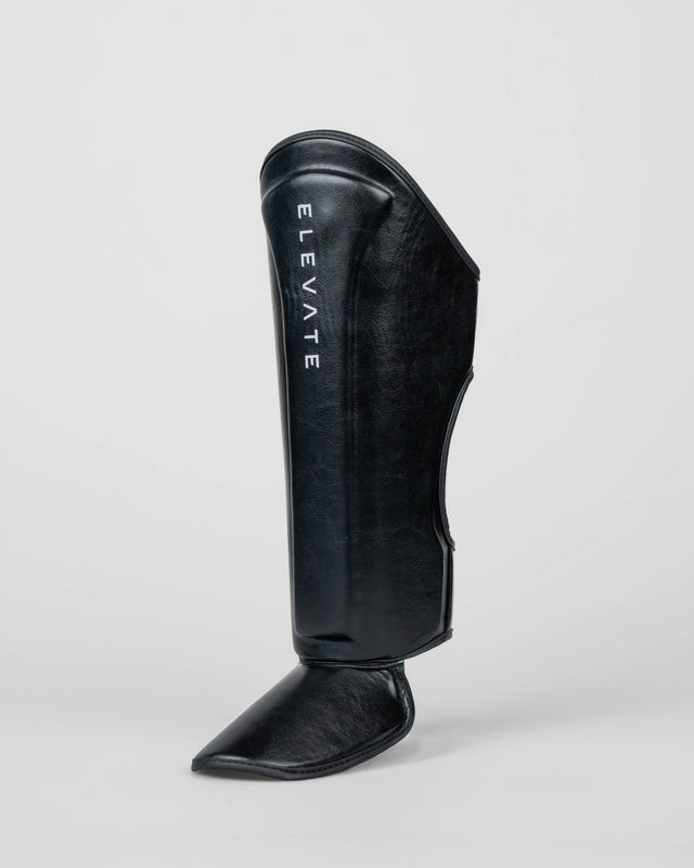 Espinilleras Elevate Prime Niños – Negro