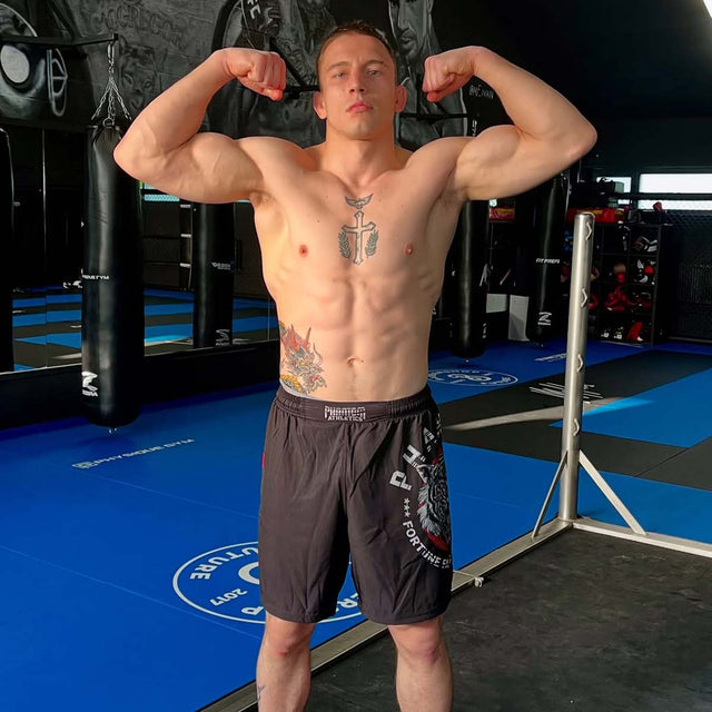 Phantom Athletics MMA-shorts EVO Tiger Unit – Svart/Tiger