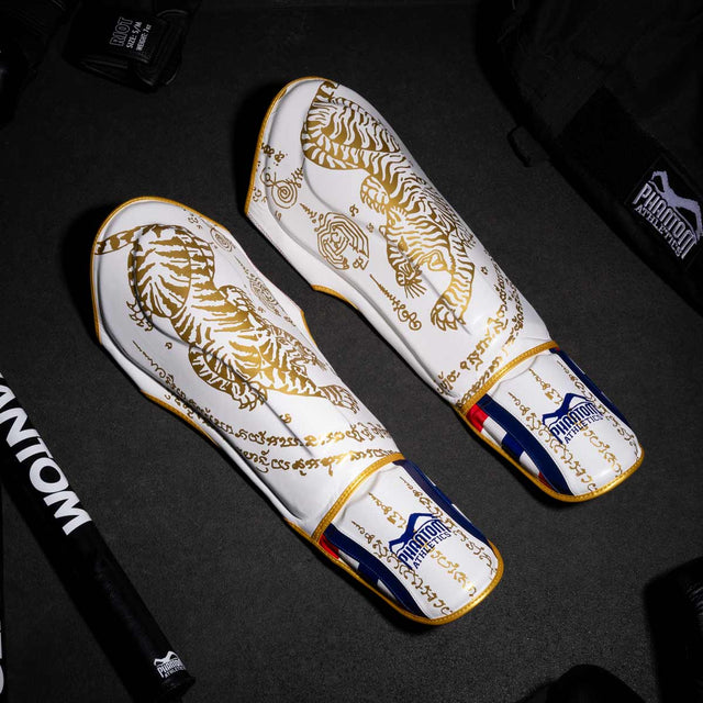 Phantom Athletics Benskydd Muay Thai – Vit/Guld