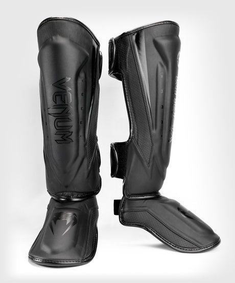 Protège-tibias Venum Elite Evo – Noir/Noir