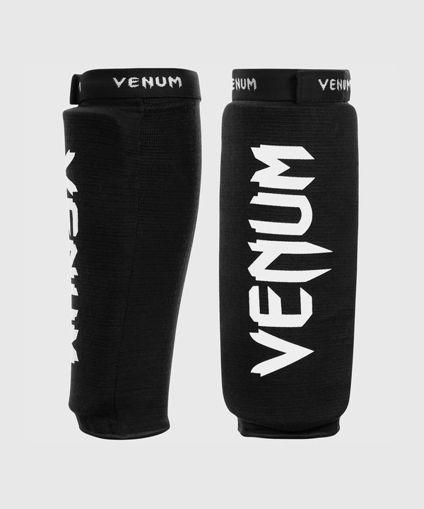 Caneleiras de kickboxing Venum Kontact sem pé – Preto/Branco