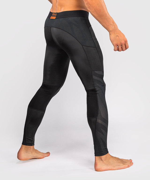 Venum G-Fit Revolution Compression shorts – Black/Bronze