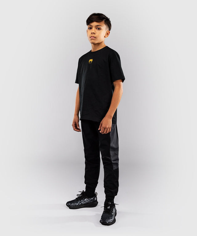 Venum T-shirt Essential Criança – Preto/Ouro