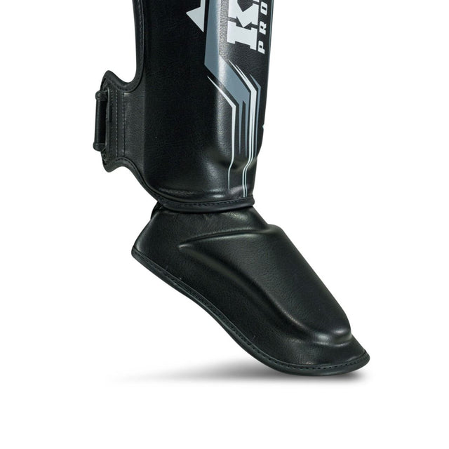 Caneleiras de kickboxing King Pro Boxing Spartan – Preto/Cinzento