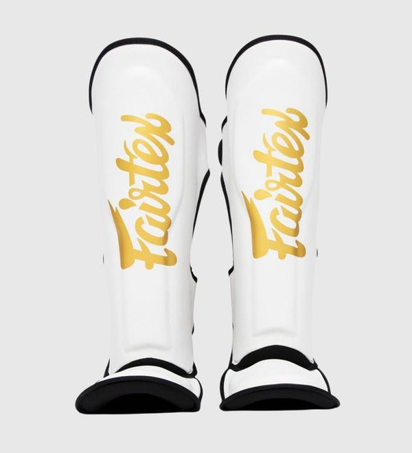 Ochraniacze na piszczele Fairtex FXB – Białe/Złote
