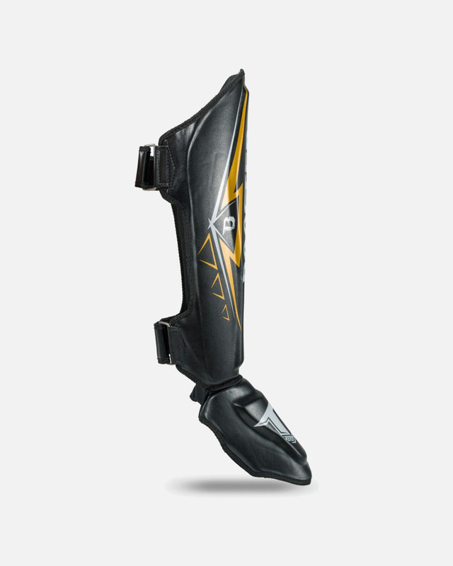 Espinilleras Booster Warrior – Negro