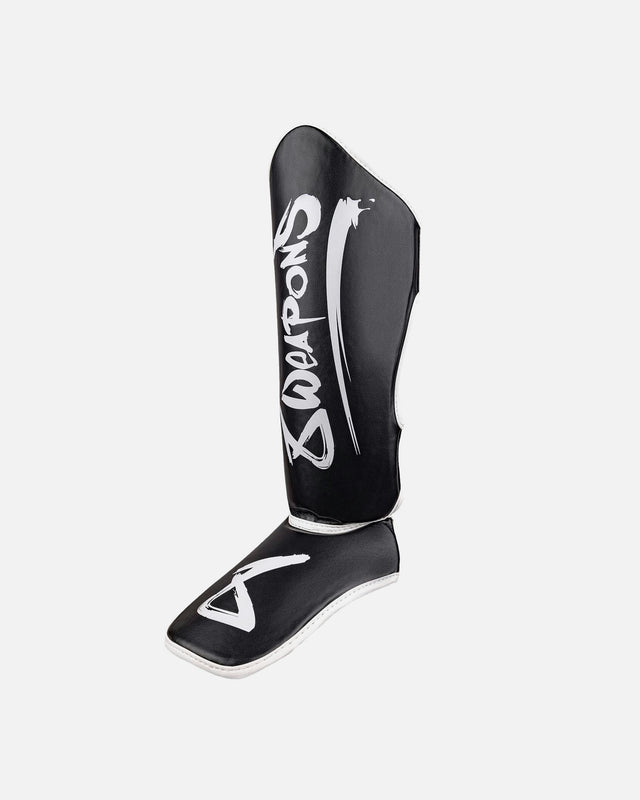 Espinilleras 8 WEAPONS Unlimited 2.0 – Negro/Blanco
