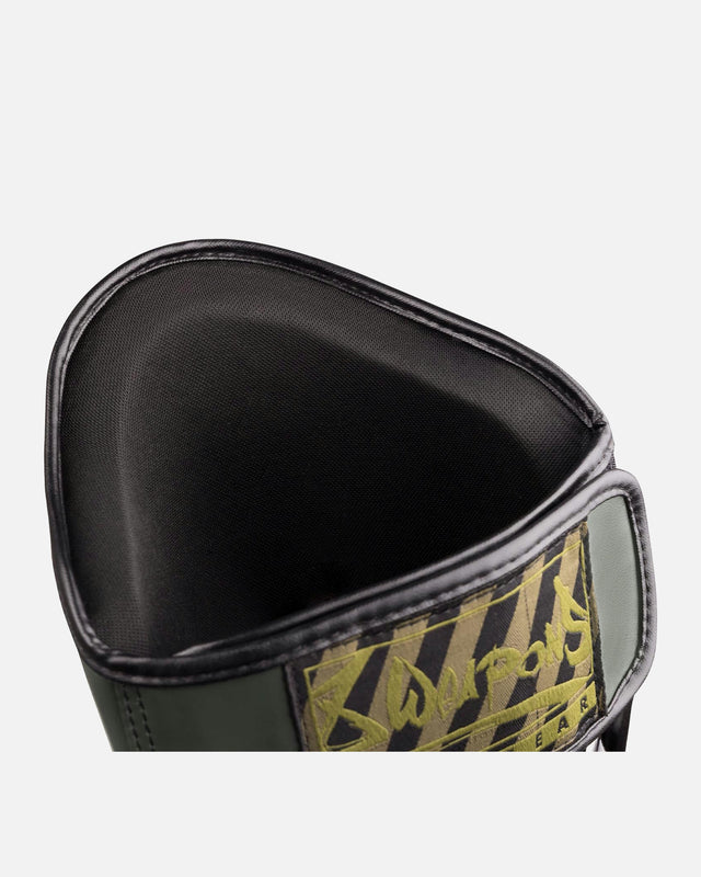 8 WEAPONS Schienbeinschoner Unlimited 2.0 – Olive/Schwarz