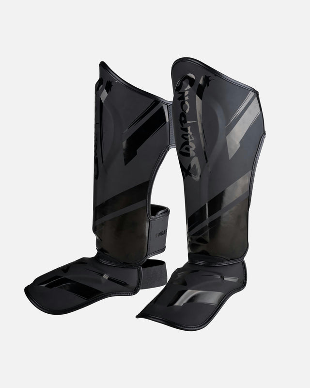 Espinilleras 8 WEAPONS Shift – Negro