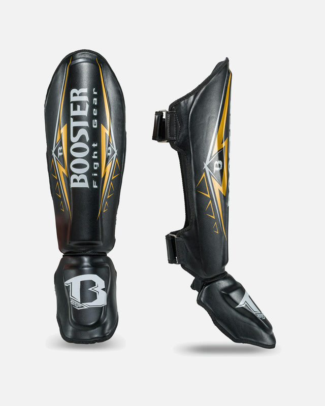 Espinilleras Booster Warrior – Negro