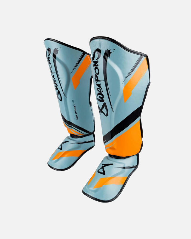 Espinilleras 8 WEAPONS Shift – Gris hielo/Naranja
