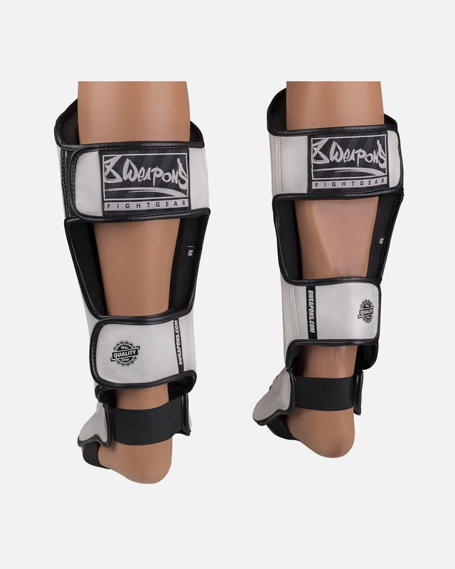 8 WEAPONS Skinnebensbeskyttere Unlimited 2.0 – Hvid/Sort