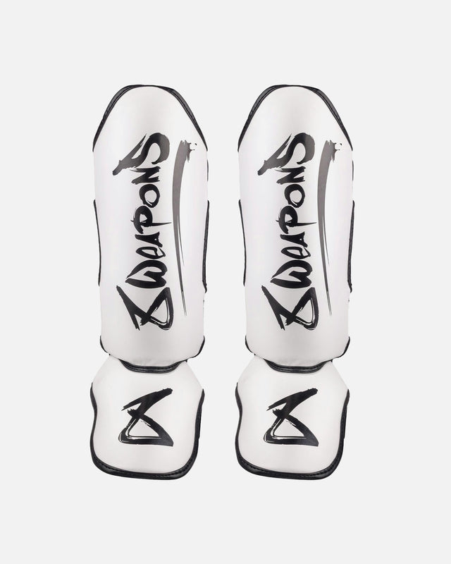 Espinilleras 8 WEAPONS Unlimited 2.0 – Blanco/Negro
