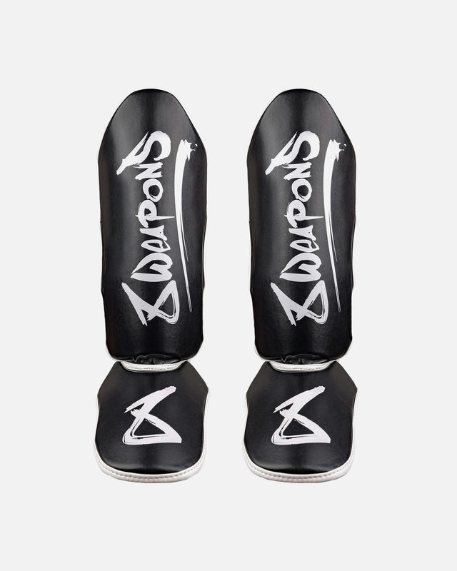 Espinilleras 8 WEAPONS Unlimited 2.0 – Negro/Blanco