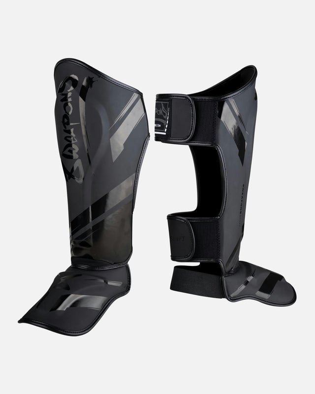 Espinilleras 8 WEAPONS Shift – Negro