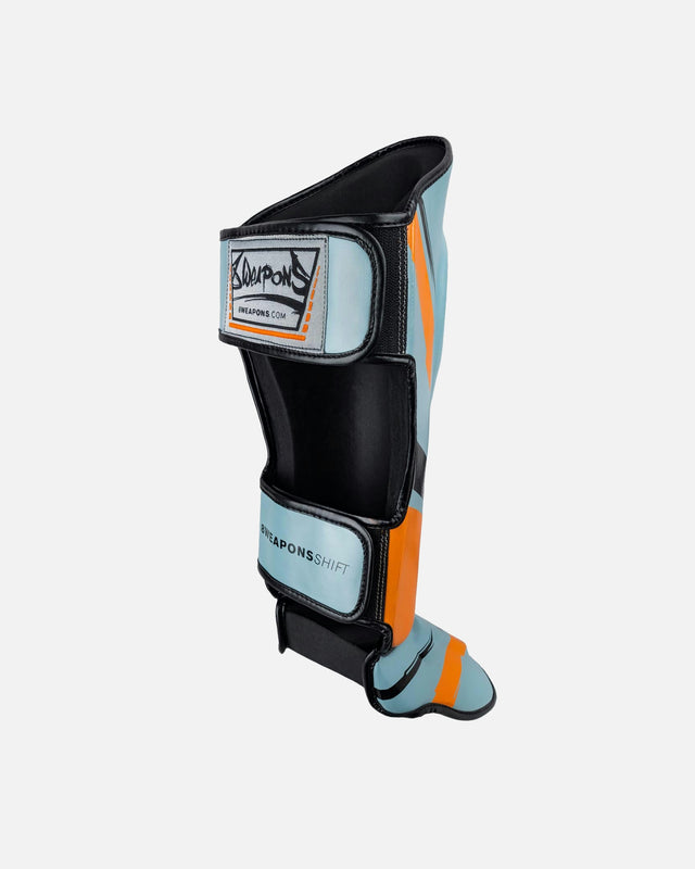 Espinilleras 8 WEAPONS Shift – Gris hielo/Naranja